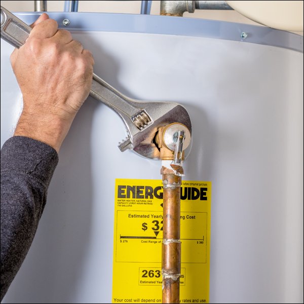 Fixing Water Heater with Wrench